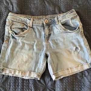 blue jean shorts with rips
